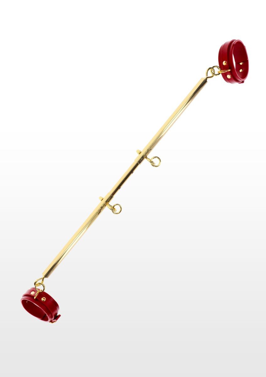 Taboom Spreader Bar with Ankle Cuffs Gold-Red, kovová rozpěrná tyč s pouty z umělé kůže
