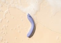 Vibrátor s podtlakovou stimuláciou Womanizer OG Aubergine