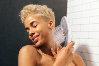 Womanizer Wave Stimulating Shower Head White
