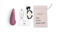 Prikladací vibrátor Womanizer Vibe Sage