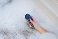 Prikladací vibrátor Womanizer Vibe Sage
