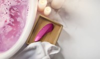 Stimulátor klitorisu Womanizer Enhance Lilac