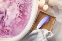 Stimulátor klitorisu Womanizer Enhance Lilac