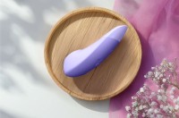 Stimulátor klitorisu Womanizer Enhance Lilac
