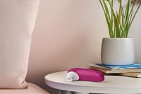 Stimulátor klitorisu Womanizer Pro růžový