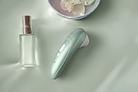 Stimulátor klitorisu Womanizer Pro růžový